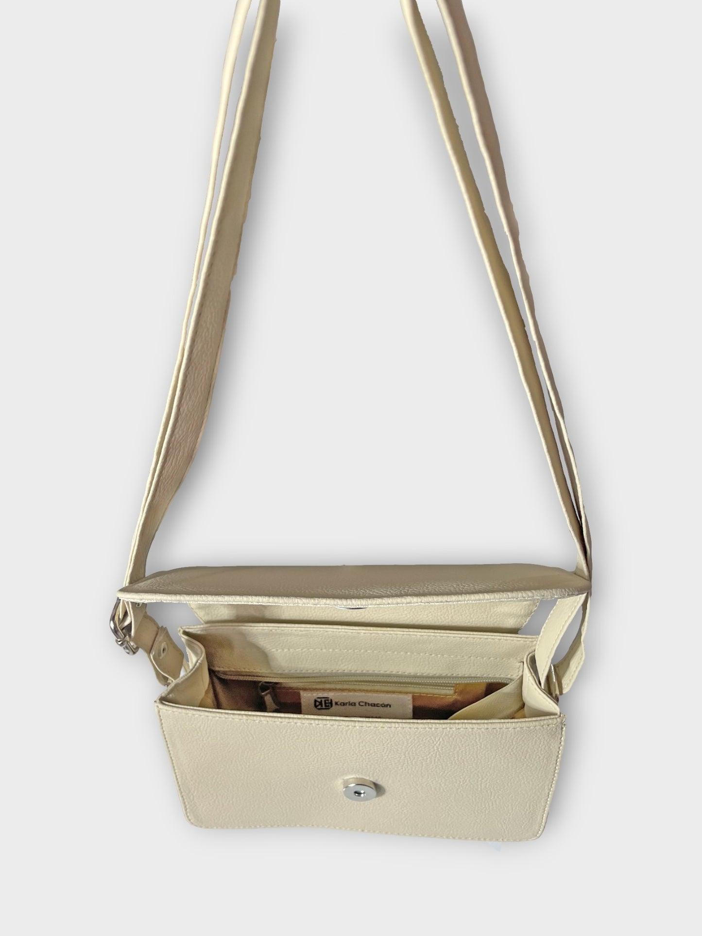 Set de tres piezas Combo Tote Mila + Manos libres Nova + Monedero